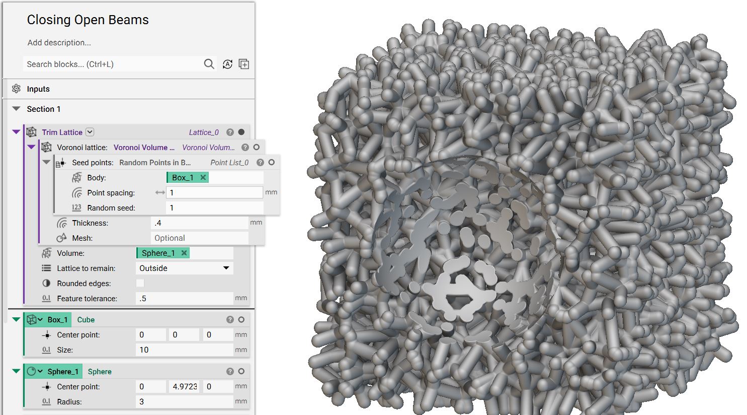 A voronoi volume lattice that has a half sphere cut out from it. The beams end where the sphere was removed.