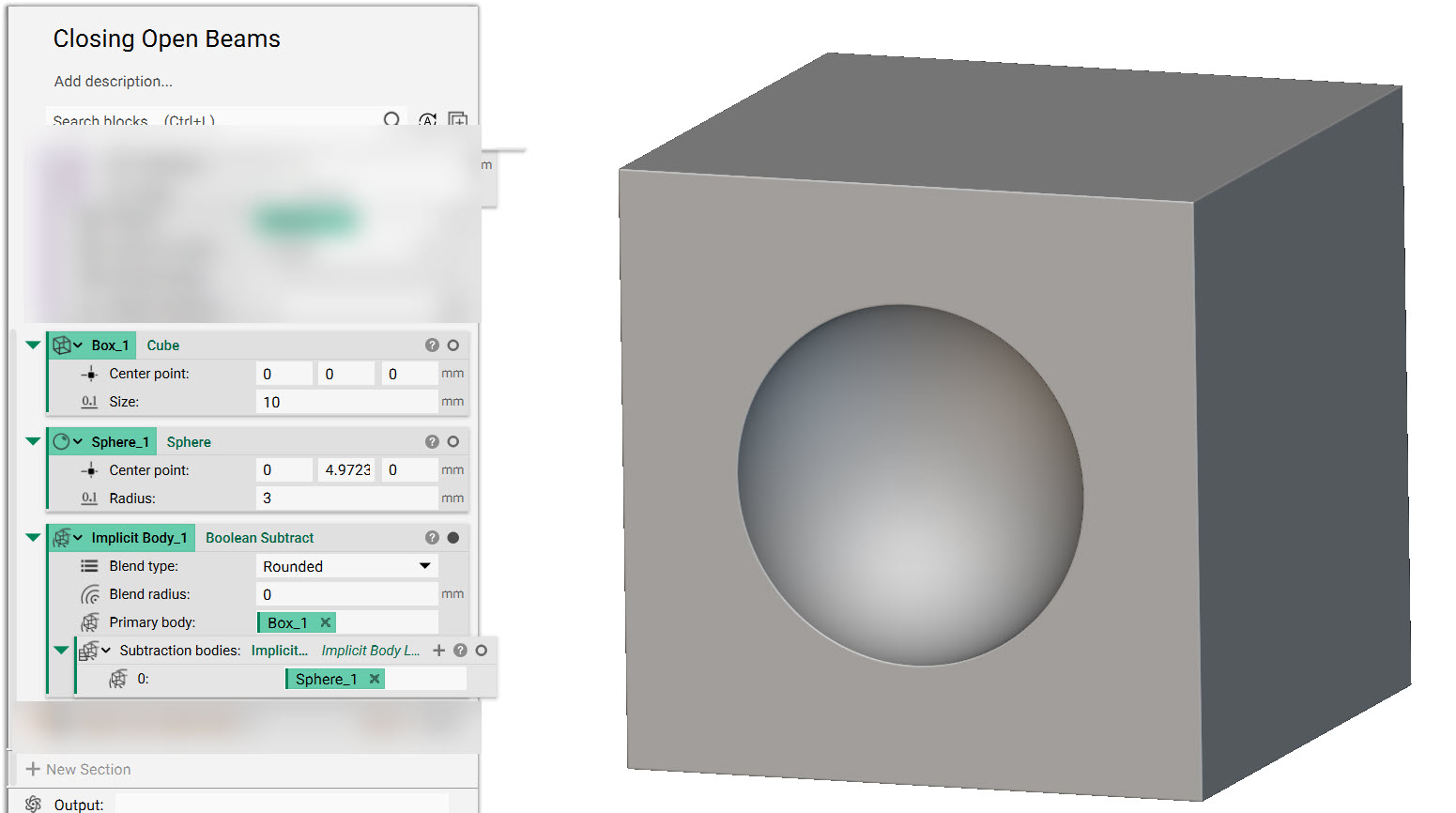 A cube with a half sphere subtracted from one of the faces.