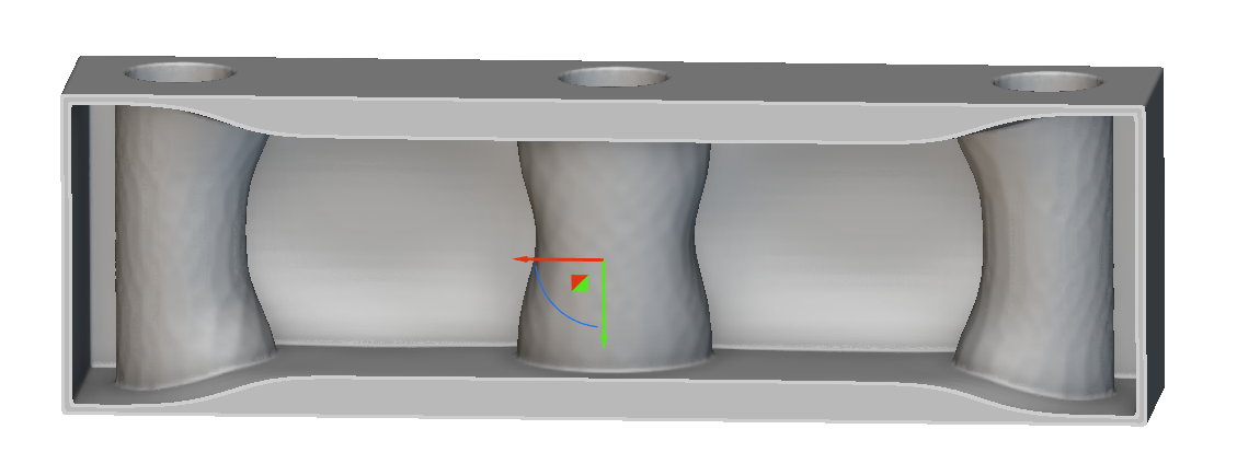 An example of the Parametric Shell Component block. The image shows a part that has variable shell thickness applied. 